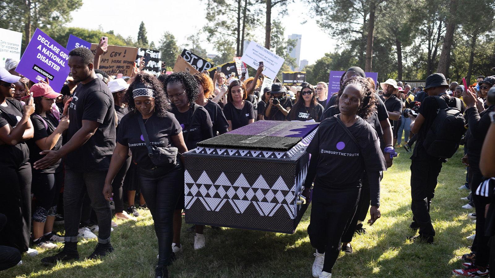 The Unburied Casket being carried through Pretoria